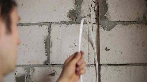 Installation of hidden wiring Stock Footage 61650322