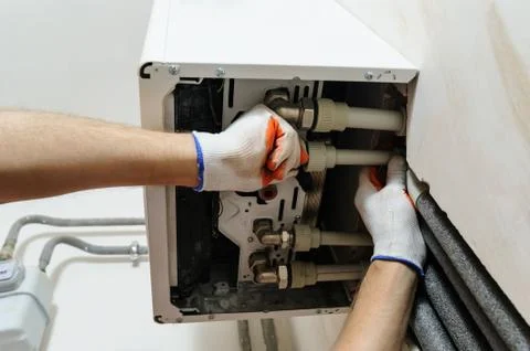 Installation of home heating. Stock Photos