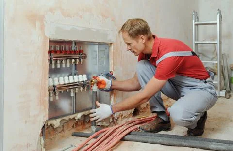 Installation of home heating. Stock Photos