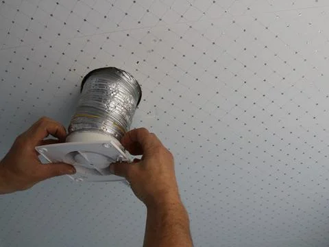 Installation of household ceiling ventilation Stock Photos