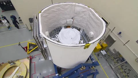 Installation of the IDA-3 into the trunk of SpaceX's Dragon spacecraft Stock Footage 289728827