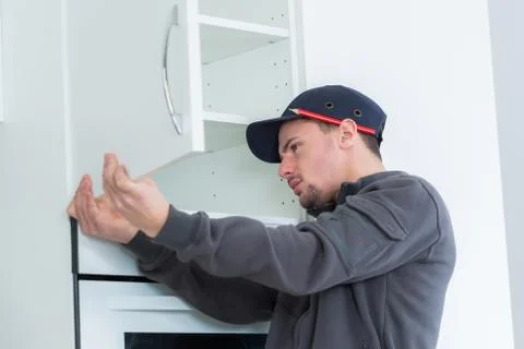 Installation of a kitchen Stock Photos