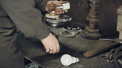 Installation of light bulbs and wiring to the lamp Stock Footage 98014203