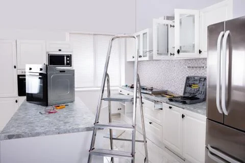 Installation Of Luxurious Oven In The Modular Kitchen Stock Photos