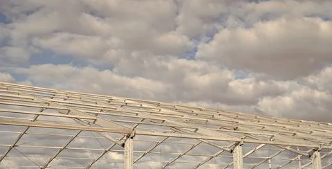 Installation of metal structure at cloudy sky. Metal construction. Structural Stock Photos