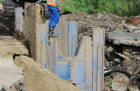 Installation of metal structures - immediate support for draining soil at the Stock Photos