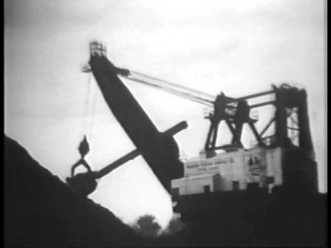 An installation at a mine and a pilot climbing on the outside of a self-flying Video stock 79463404