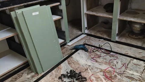 Installation of a Modern Modular Kitchen with Sage Green Cabinets 스톡 동영상 325039478