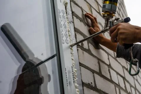 Installation of the modern window made of PVC profiles Stock Photos