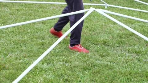 Installation of modular tent from elements Stock Footage 70985890