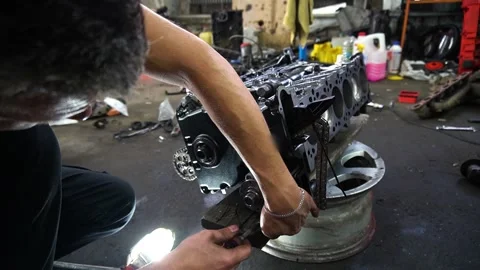 Installation of new engine cover and paw seals Stock Footage 325767935