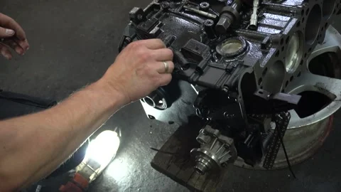 Installation of new engine cover and paw seals Video stock 325768040