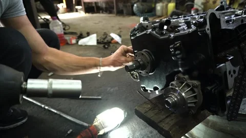 Installation of new engine cover and paw seals Stock Footage 325768047