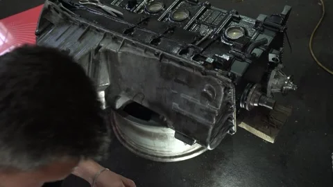 Installation of new engine cover and paw seals Stock Footage 325768068