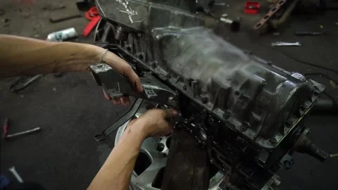 Installation of new engine cover and paw seals Stock Footage 325768082