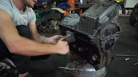 Installation of new engine cover and paw seals Video stock 325768224