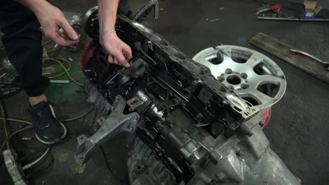 Installation of new engine cover and paw seals Video stock 325768472