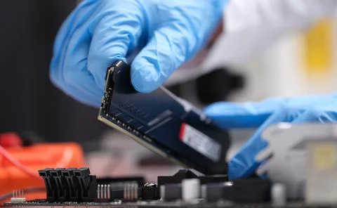 Installation of new RAM or processor of personal computer in service. 写真素材