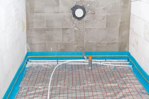 Installation of new underfloor heating Foto stock