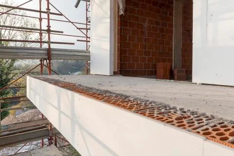 Installation of outer coat insulating on a residential home Stock Photos