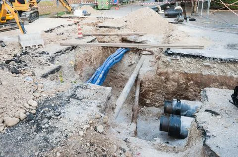 Installation of the pipes for district heating. Stock Photos