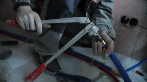 Installation of plastic pipes for heating Stock Footage 279910272