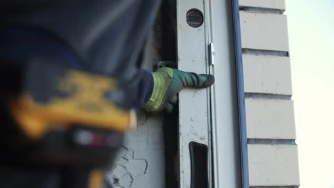 Installation of plastic windows master uses level Stock Footage 284154520