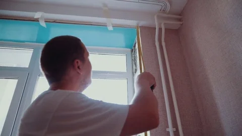 Installation of plastic windowsill in the house Stock Footage 81501716