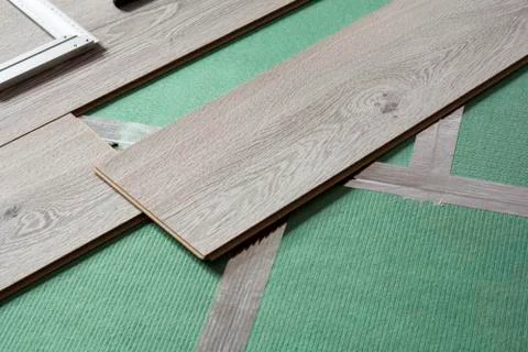 Installation process of gray laminate Stock Photos