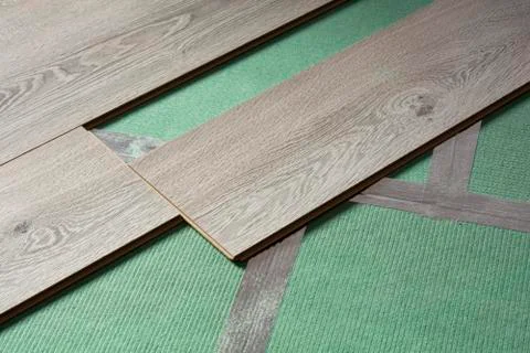 Installation process of gray laminate Stock Photos