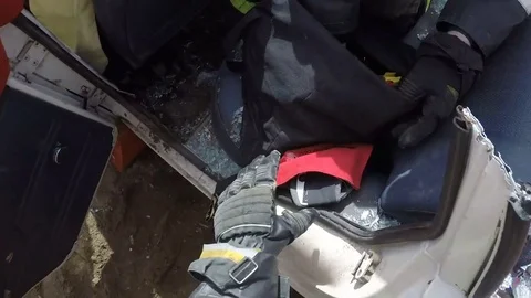 Installation of protective covers on the trimmed auto racks. Emergency . Stock Footage 77143059