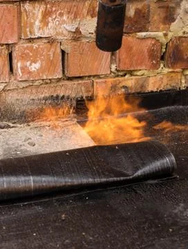 Installation of roll  waterproofing Stock Photos