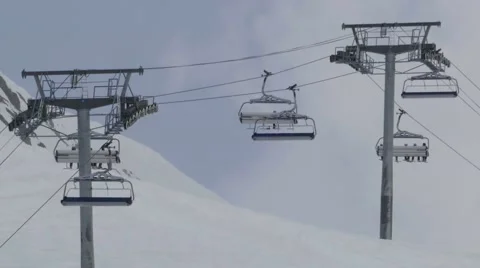 Installation of the ropeway leading to the upper end of the ski pistes on mou Stock Footage 68944411