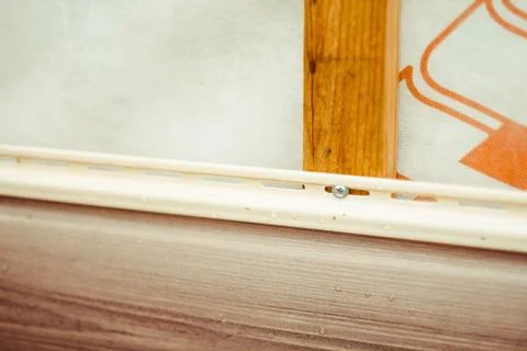 Installation of siding on the facade of the house Stock Photos