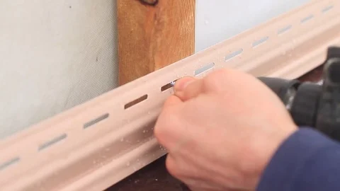Installation of siding Stock Footage 80209716