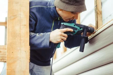 Installation of siding Stock Photos