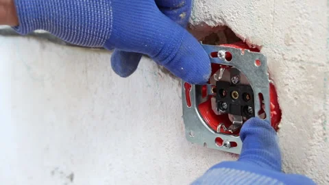 Installation of the socket by an electrician. Stock Footage 280495686