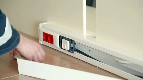 Installation of the socket Stock Footage 80309028