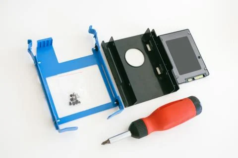 INstallation of SSD 2.5 in 3. 5 cradle Stock Photos