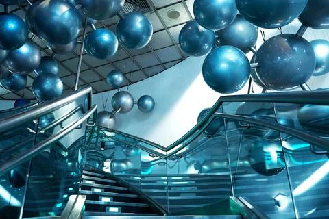 Installation of stylish connected silver balls decoration modern interior in  Stock Photos