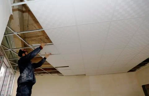 Installation of suspended ceilings. Stock Photos
