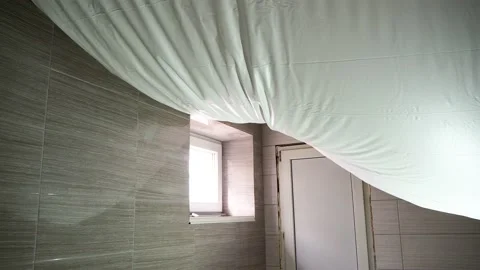 Installation of suspended suspended ceiling in the bathroom. Repairing flat. New Stock Footage 134262468