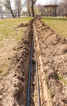 Installation of tubes for an irrigation system Stock Photos