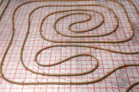 Installation of underfloor heating system in building Fotos de archivo