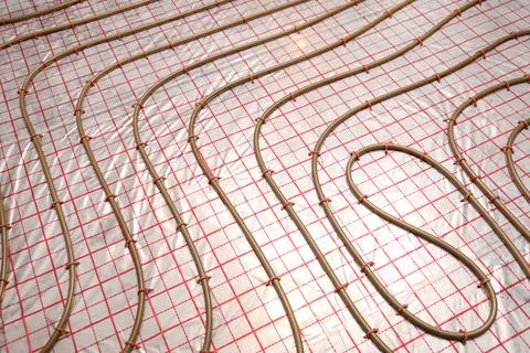 Installation of underfloor heating system in building Fotos de archivo