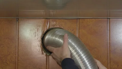 Installation of ventilation system under ceiling in room. Stock Footage 262058714