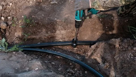 Installation of a water supply system from HDPE pipes Stock Footage 290166404