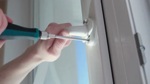 Installation of a window handle Stock Footage 152613086
