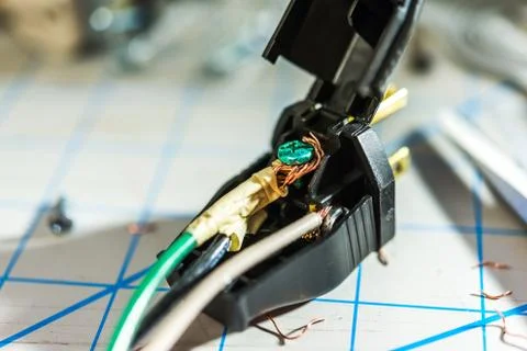 Installation wire in to a plug. Stock Photos