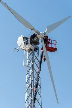 Installation work on a wind turbine using an aerial platform Stock Photos